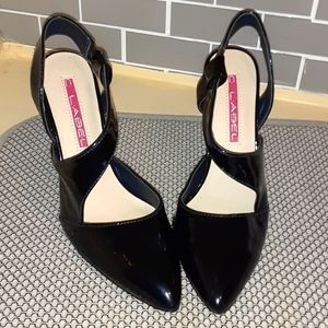 black patent leather look 4 in heels with side straps and stretchy side band for
